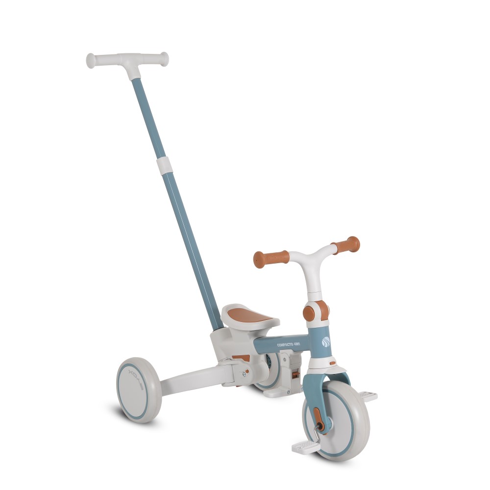 Η φωτογραφία δείχνει Compacto 4 σε 1, Byox – το τρίκυκλο που μεγαλώνει μαζί με το παιδί σας!Το πολυλειτουργικό τρίκυκλο Compacto 4 σε 1 έχει σχεδιαστεί για να προσαρμόζεται στις ανάγκες του παιδιού σας – από τις πρώτες κιόλας βόλτες μέχρι τις πρώτες ανεξάρτητες βόλτες του.