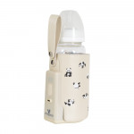 Η φωτογραφία δείχνει Ο φορητός θερμαντήρας μπιμπερό Caliente, Cangaroo, είναι ιδανικός για βόλτες, ταξίδια ή νυχτερινά τάισμα – χάρη στην ενσωματωμένη μπαταρία του, μπορείτε να ζεστάνετε τα μπιμπερό του μωρού σας οπουδήποτε χωρίς να χρειάζεστε πρίζα.