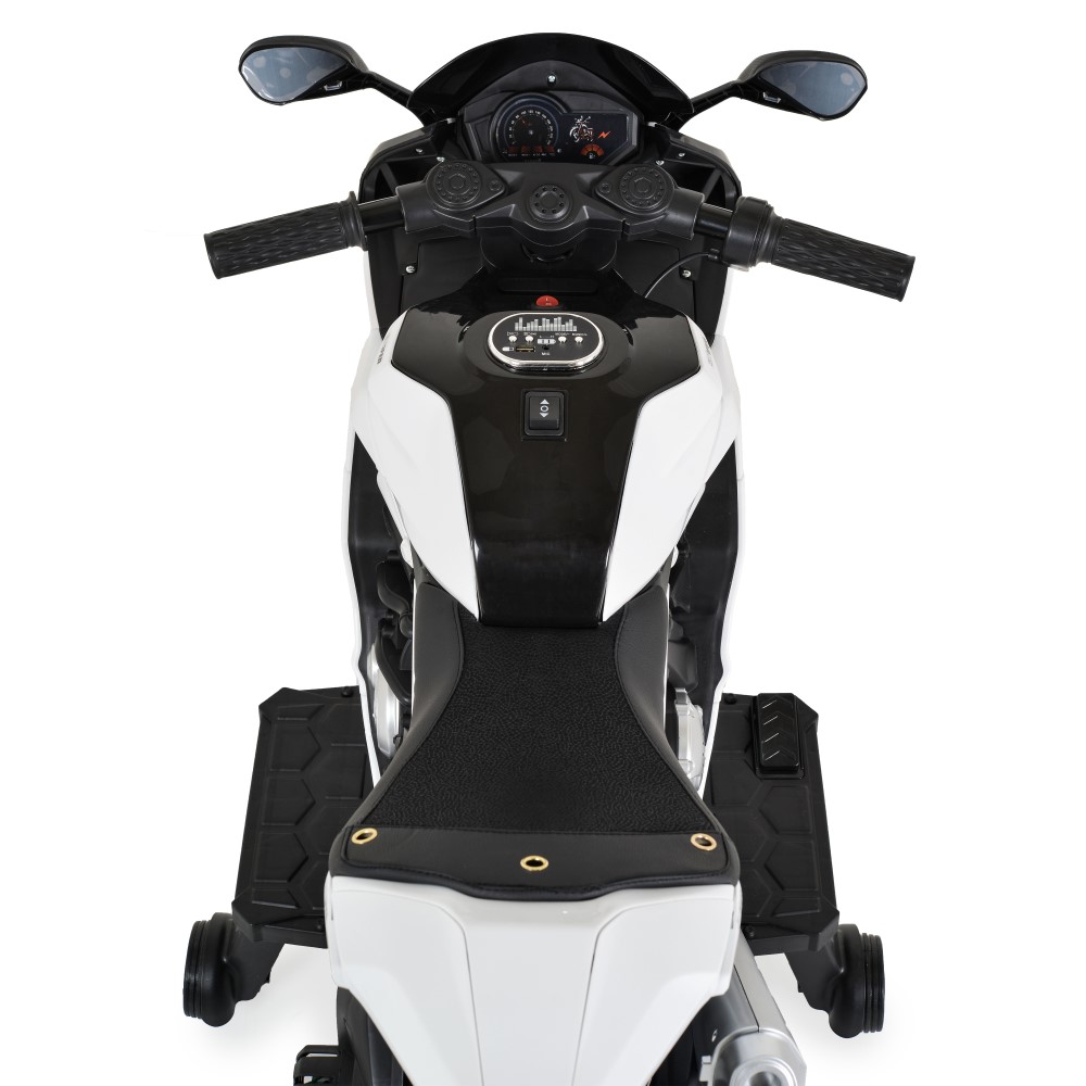 Η φωτογραφία δείχνει Moni, Παιδική Ηλεκτρική Μοτοσικλέτα Surfer για Παιδιά – Για Μικρούς που Αναζητούν την Περιπέτεια!Χαρίστε στο παιδί σας τον ενθουσιασμό της ελευθερίας και του ενθουσιασμού με την Surfer – μια κομψή, ισχυρή και απόλυτα ασφαλή ηλεκτρική μοτοσικλέτα, ειδικά σχεδιασμένη για παιδιά ηλ