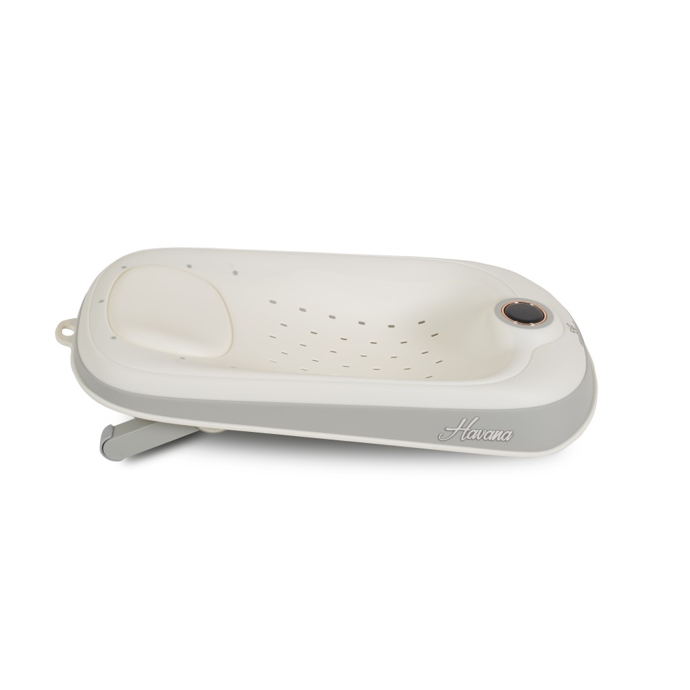 Η φωτογραφία δείχνει Η βάση στήριξης μπάνιου Havana συνδυάζει όλα όσα χρειάζεστε για μια ήρεμη και ευχάριστη εμπειρία μπάνιου για το μωρό σας.