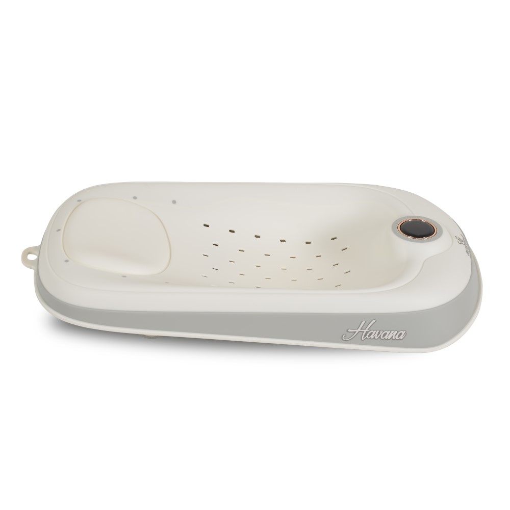 Η φωτογραφία δείχνει Η βάση στήριξης μπάνιου Havana συνδυάζει όλα όσα χρειάζεστε για μια ήρεμη και ευχάριστη εμπειρία μπάνιου για το μωρό σας.