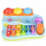 Η φωτογραφία δείχνει Το ξυλόφωνο έχει 6 πλήκτρα, το καθένα έχει διαφορετικό χρώμα και έχει γράμματα και αριθμούς.