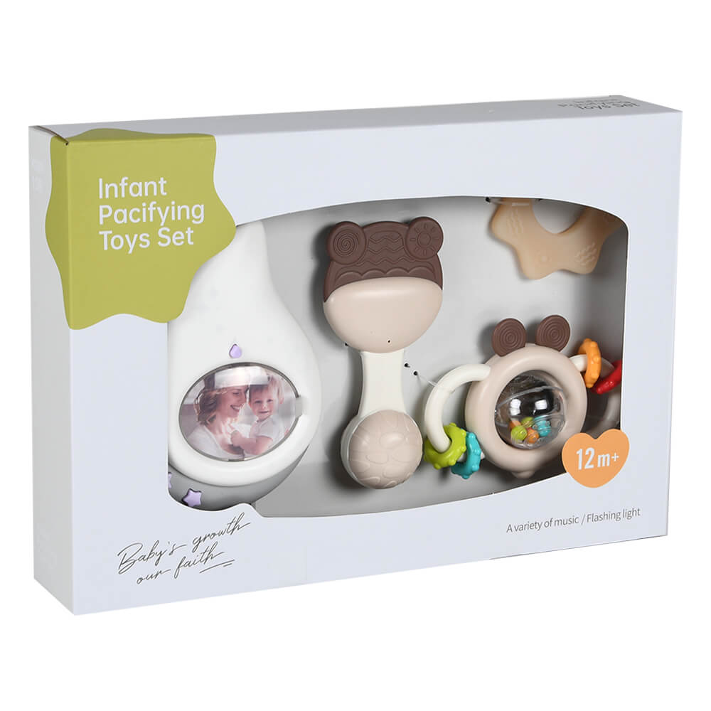 Η φωτογραφία δείχνει – Το σετ διαθέτει λάμπα νυκτός, μασητικά και κουδουνίστρες.