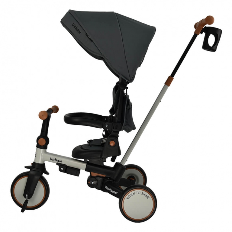 Η φωτογραφία δείχνει Ετοιμαστείτε μικροί και μεγάλοι για τις πιο συναρπαστικές βόλτες σε κάθε γωνιά της πόλης με το νέο τρίκυκλο Urban της Bebe Stars!Ένα πολυχρηστικό μοντέλο, καθώς χρησιμοποιείται με 7 διαφορετικούς τρόπους και συντροφεύει το παιδάκι σας για χρόνια σε κάθε του βήμα.