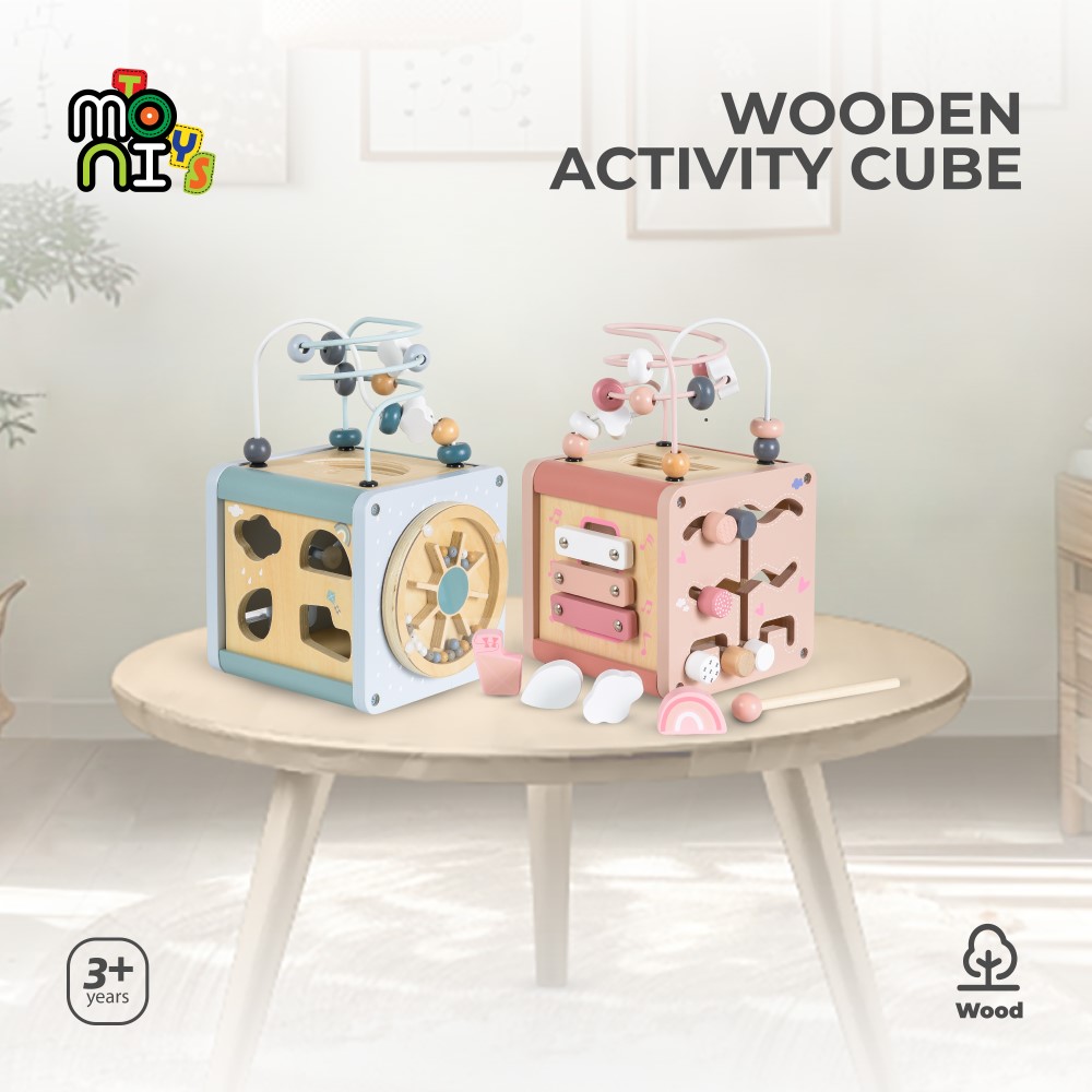 Η φωτογραφία δείχνει Αυτός ο πολυλειτουργικός ξύλινος κύβος δραστηριοτήτων από την Moni Toys προσφέρει διασκέδαση και μάθηση μέσα από το παιχνίδι! Κάθε πλευρά διαθέτει μια διαφορετική δραστηριότητα που διεγείρει τη φαντασία και υποστηρίζει την ανάπτυξη του παιδιού σας.