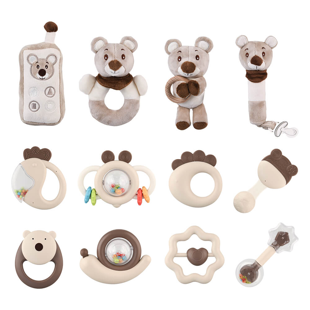 Η φωτογραφία δείχνει Το σετ περιλαμβάνει διάφορες κουδουνίστρες (μαλακές και μη) και μασητικά σε πολλά σχήματα και σχέδια από ζωάκια, ώστε να είναι δελεαστικά στα παιδιά και να απασχολούνται συνέχεια όσο ανακουφίζονται από οδοντικούς πόνους, καθώς και μια κουδουνίστρα με δυνατότητα να κρεμάσετε τη π